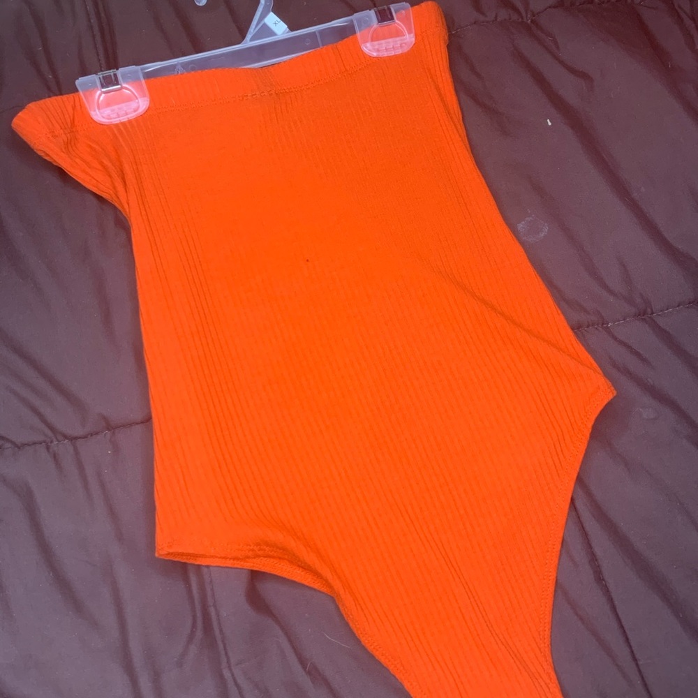 Bright orange bodysuit